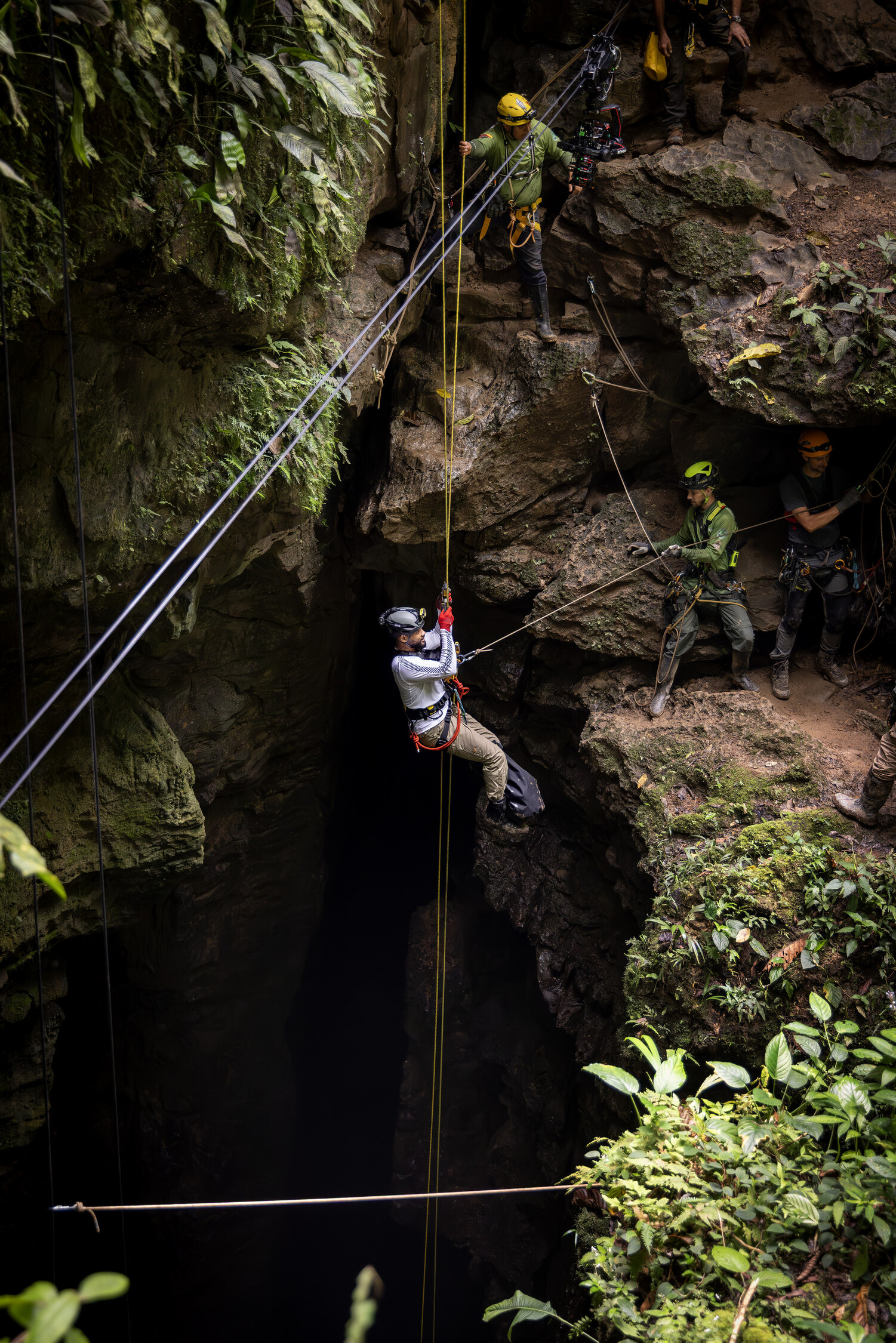 Will Smith descends 206 feet into La Cueva de los Tayos as they go to search for new life. (credit: National Geographic/ Kyle Christy)