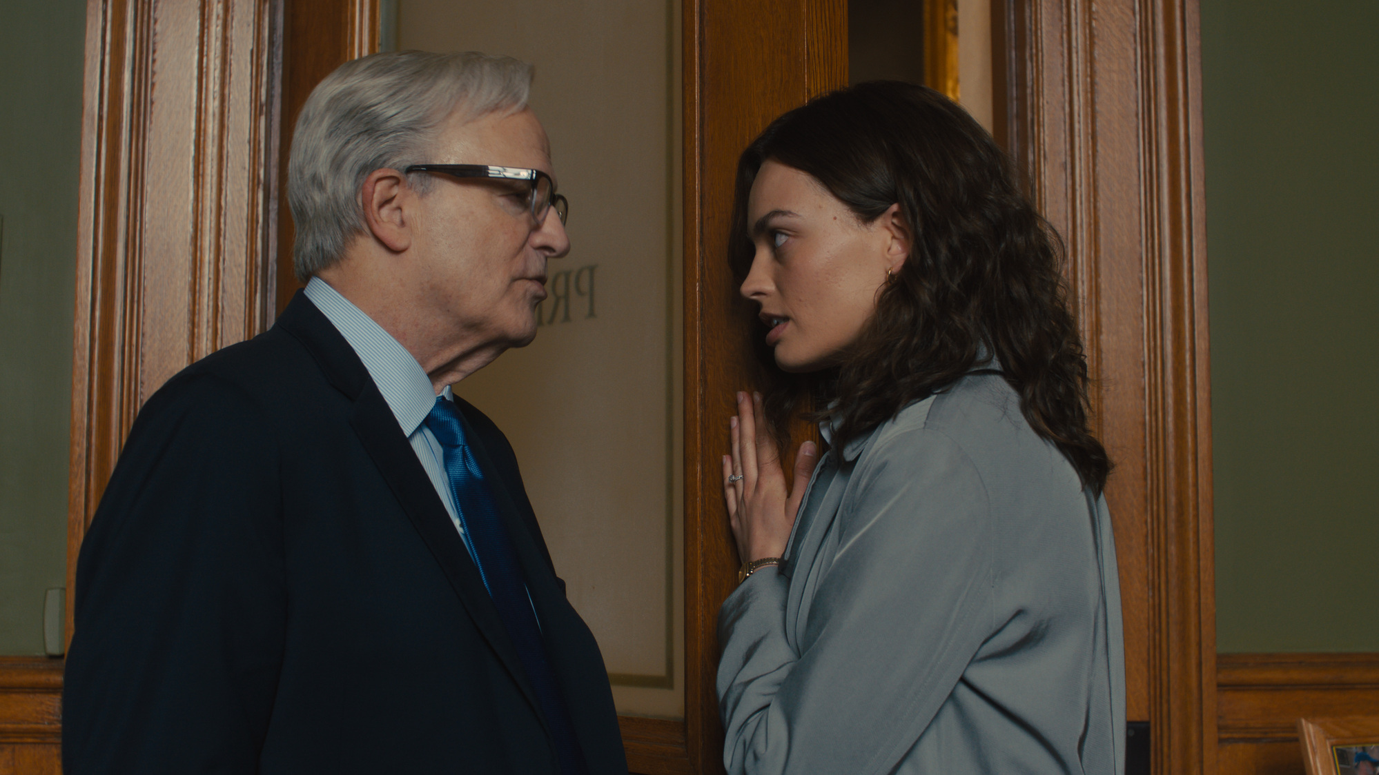 (L-R) Albert Brooks as Governor Bill and Emma Mackey as Ella McCay in 20th Century Studios' ELLA MCCAY. Photo by Claire Folger. © 2025 20th Century Studios. All Rights Reserved.